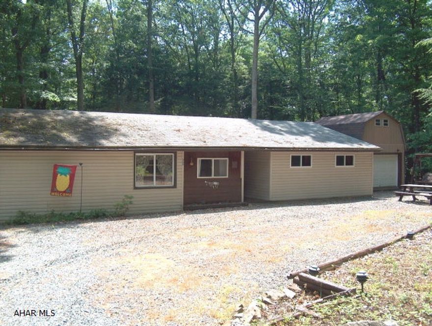 Super nice modified single wide MH with additions & shed on large lot.