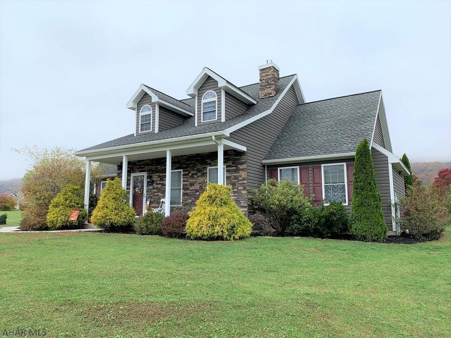 Custom built (Bill Waltman Builder) cape cod home resting in Hawthorne Manor Development. This quality home offers a LR w/ hardwood floors & stone hearth fireplace; kit w/ granite counters, breakfast bar & nook, ceramic tile backsplash & floors; dining area w/ hardwood floors & sliding doors to the rear yard; owner's bedroom w/ walk-in closet & en-suite bath; two additional bedrooms w/ oak floors, laundry room & another full bath. Second level has a huge loft (could be an additional bedroom) w/ skylights & finished dormers. Full basement, heat pump w/ central air, well, public sewer & 200 amp electric. Front covered porch with stone, rear patio, paved driveway & 2-car attached garage. Large .44 acre lot with privacy fence. Super location close to all supporting amenities & major roads!