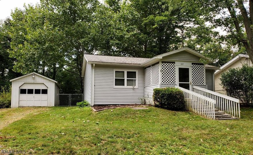 Here's an opportunity to downsize, or buy your own getaway close to Shawnee State Park.  Fenced in back yard with 2 tiered deck, 2 bedroom, 1 bath with walk-in shower, across from State owned land across from the property. Friendly community within a close distance to Bedford, Altoona, Johnstown, Somerset or Cumberland, MD.