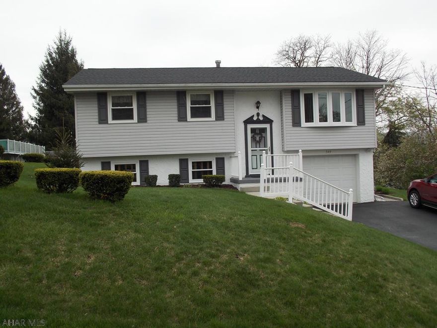 Move right in to the very well maintained home!  Maintenance free exterior with new siding, vinyl handrails, roof and windows. .  Inside, this home is move in ready!  Beautiful new bath, updated kitchen and a  cozy finished basement with a gas fireplace and more.  Hurry, this one won't last!  Call us TODAY, you won't be disappointed .  Just imagine enjoying your summer relaxing on the screened in deck.