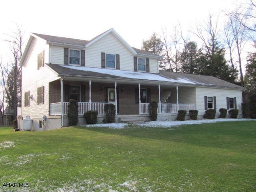 Central Cambria school district- 9 year old 2 story brick & vinyl sided 3 BR, 2  bath house on 1.9 acres bordering State Game Lands. Propane fireplace in FR, 2 car attached garage, large rear deck.