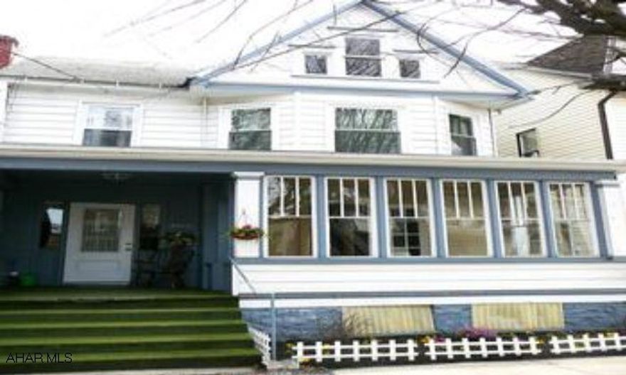 Large 4 bedroom home with spacious rooms. Nicely remodeled with new kitchen cabinets, carpet, paint and more.  Great for first time home buyers with all the updates for FHA.  Finshed 3rd floor with heat and closets. Definitely worth seeing!
