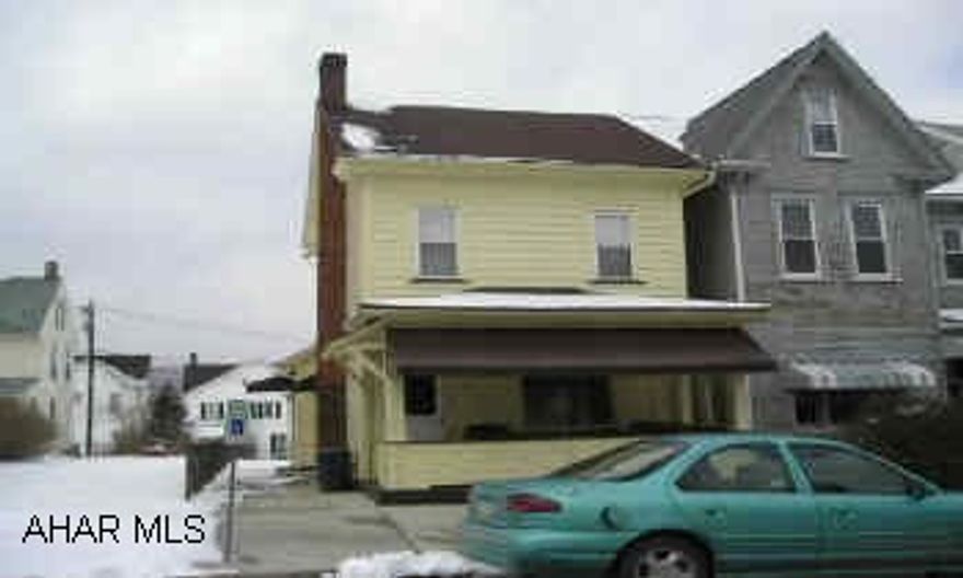 Move right in to this Charming home featuring a cozy front porch, newer windows, LR, DR, K, 2BR, BA.  Must see! Nice, clean home that is ready to move into.