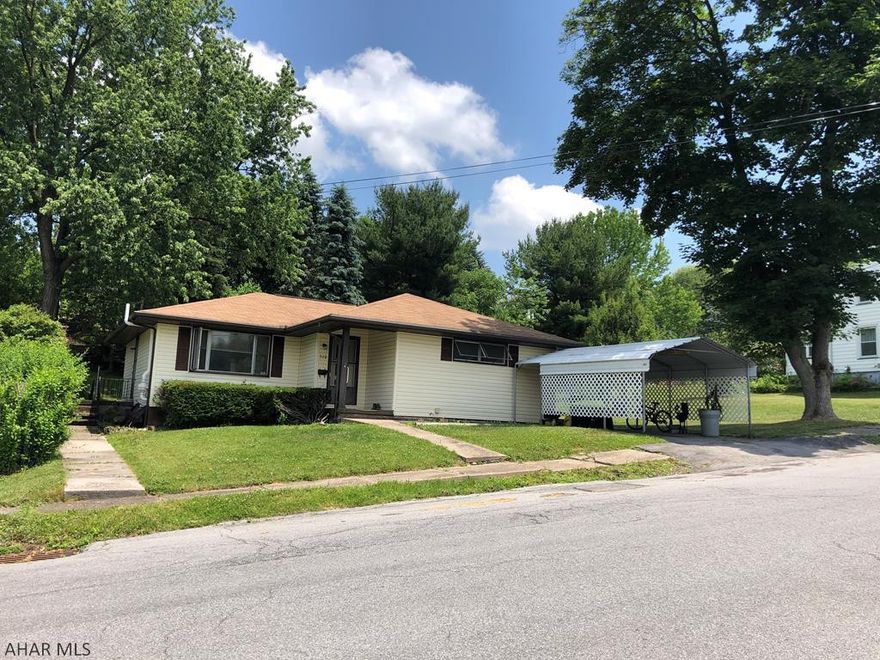 This spacious one floor ranch house is ready for you to put your finishing touches in it.  The wall between kitchen/dining and living room has been taken down leaving a very open concept living space.  This property features 3 large bedrooms all with nice sized closets.  Newer hot water heater.  Radon mitigation system installed.  There is a 3/4 bath in basement.  Property is being sold as is.  Large lot.  There are two property tax numbers that will be sold with the sale of this house.