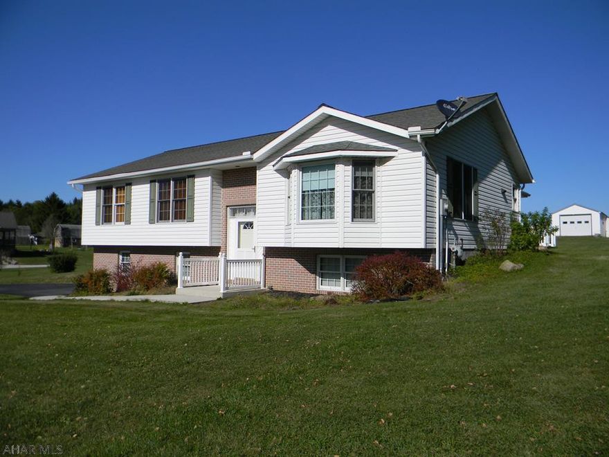 Check out this 3 bedroom 2 full bath , large eat in kitchen with birch cabinets, large dining room and living room. A beautiful large maintenance free deck, plenty of storage everywhere on both floors in this beautiful Bi-Level home . Sits on 1.38 acre. Private setting with a view. . Also a plug for an outside generator .Two car garage all in one home . Comes with a 14 by 39 shed fully insulated and wired with 110 and 220 with ceiling fans ,wonderful workshop and yet another 8 by 14 building for more storage . Outside are three raised gardens with plenty of room for all your plants. Just minutes from Historic downtown Bedford. Close to Shawnee State Park.