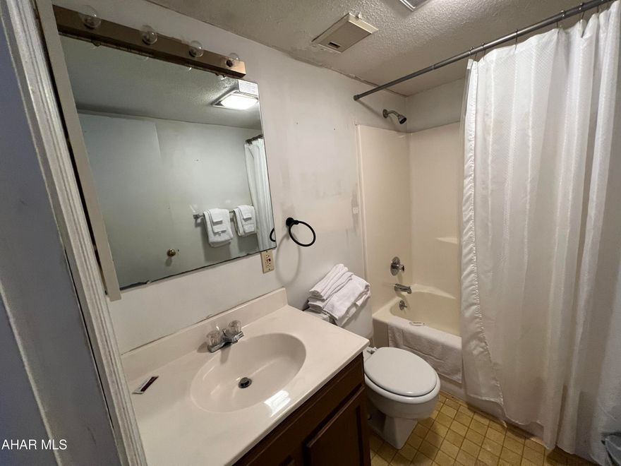 2nd floor studio you can make your own in the Allegheny Mountains at Blue Knob All Seasons Resort. New floor in the kitchen new electric fireplace, new hot water heater, stove, refrigerator and microwave.    Walking distance to indoor pool/hot tub, outdoor pool and The Club House Bar & Grille. Blue Knob is the 2nd highest mountain and highest skiable mountain in Pennsylvania! In addition to an array of winter activities, Blue Knob also has a full-service all seasons Conference Center for weddings and events, they also offer golf, swimming and multitude of trails for hiking, running, and mountain biking. Visit https://blueknob.com/activities-events/ to see all the fun events that are happening at Blue Knob. $255.00/ Mo HOA fee includes: pools, hot tub and gym area, tennis and pickle ball courts, building, property maintenance & garbage. *Conference center, Golf and Ski resort is not included in HOA fee. *