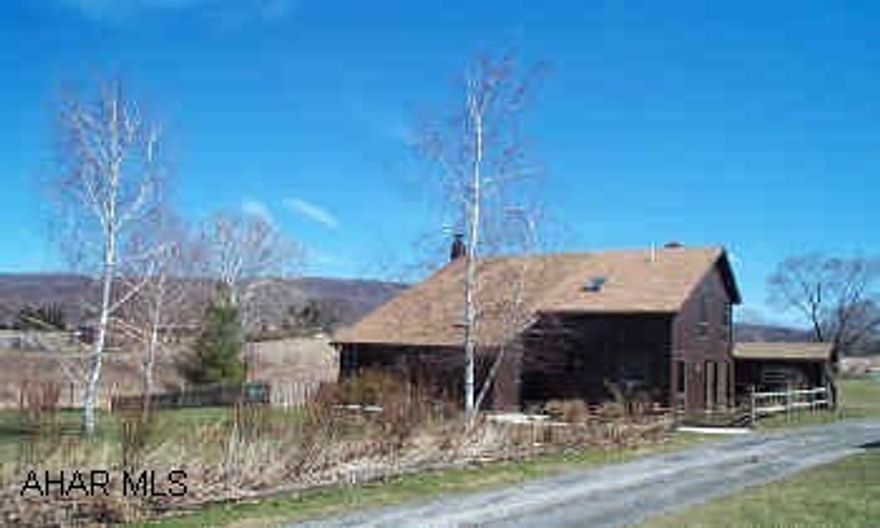 Left at light in Roaring Spring-next left is June Street Country charm with great taste-Hardwood, tile, & Pergo floors-newer addition and boiler system. 2 Loft style bedrooms, finished to a Tee.