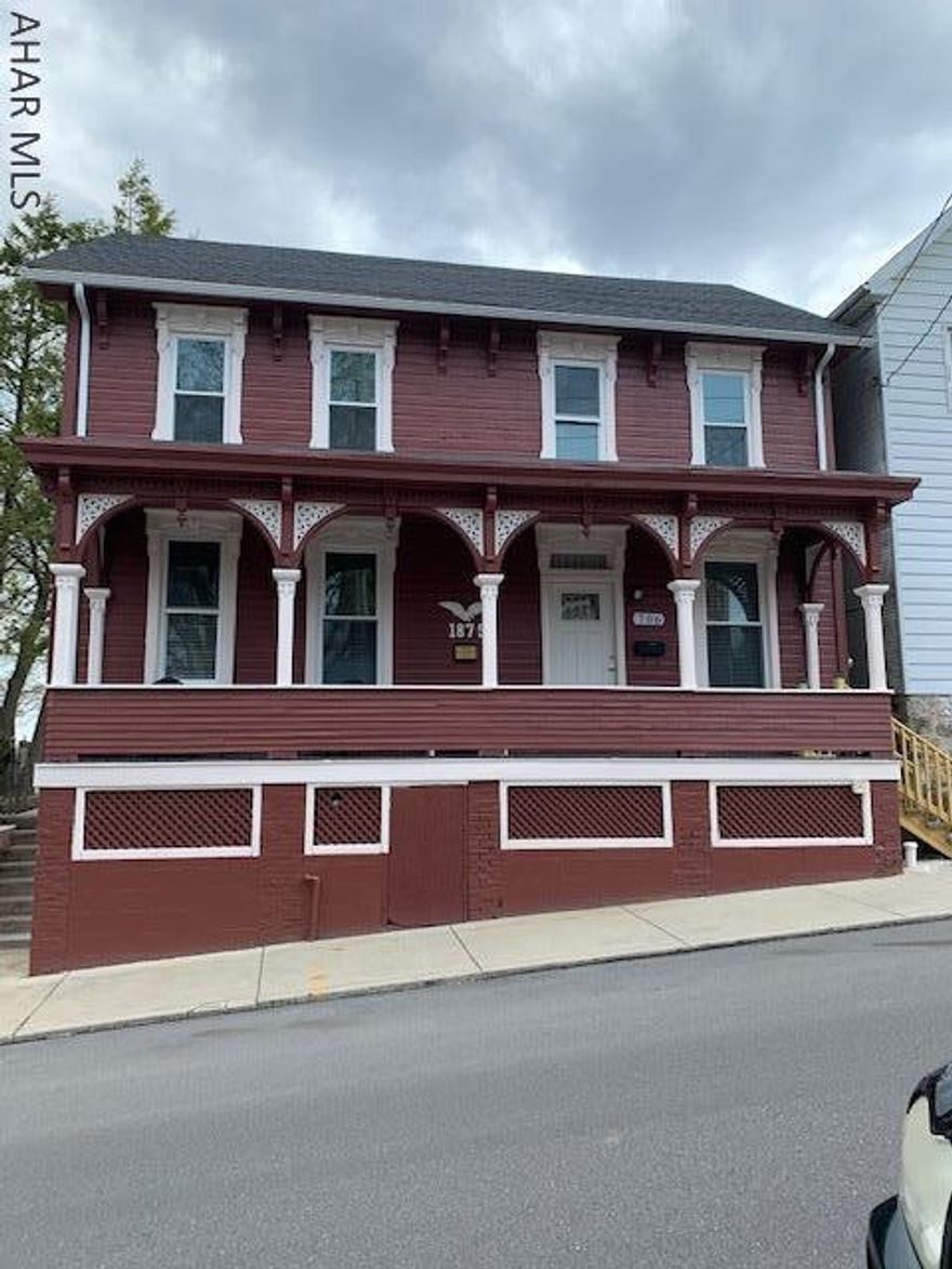 A rare find in Hollidaysburg Borough! Enjoy small town living at it's finest. This Historic 3 Bedroom home has been completely remodeled while keeping it's Historic charm. Brand new eat-in kitchen with granite countertops and lots of cabinets with new stainless steel appliances. One and a half BRAND NEW bathrooms. New windows, new hardwood floors downstairs,TV room, and formal dining room. The three bedrooms are nicely sized. Roomy attic that could be made into a bedroom or game room. Beautiful back patio area with a nice backyard! New gas furnace, water heater, electrical wiring / panel box, and new plumbing. This home features central air plus a first floor laundry room with brand new washer and dryer. Downtown Hollidaysburg is within walking distance.