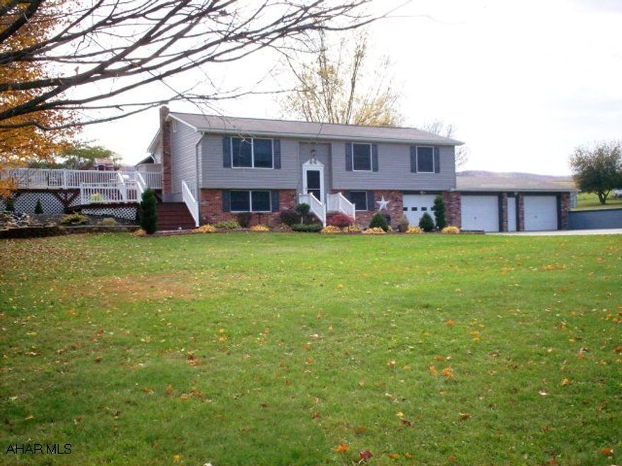 This beautifully landscaped home is one of a kind! It comes complete with a small water pond within the landscaping itself and various fruit trees. The exterior is partial brick and vinyl siding with a large 3 car attached garage. If you like to entertain, you will have a choice to make. You can use either the nicely sized rec room downstairs, complete with a coal burning pellet stove(2 ton of pellets included)or the two-tier deck (newly stained)in the rear of the home. There is also an above ground pool and matching outside shed(23' x 13').  This property sits on a 1 acre parcel located in Snake Spring Township, only minutes from both Bedford and Everett,PA. (Bedford Area Schools).