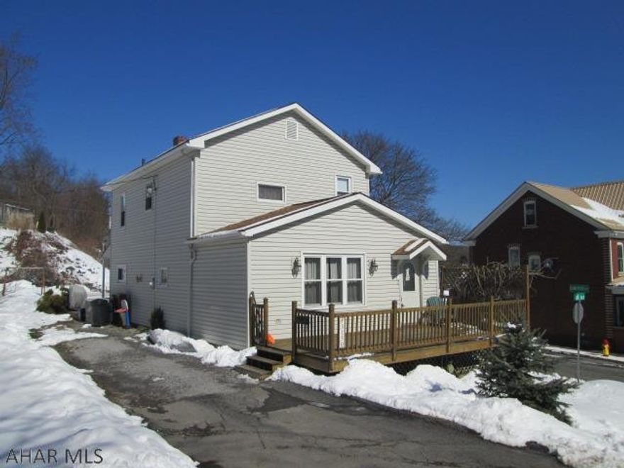 If you're looking for a quiet area w/nice flat lot and priced to sell, this is it. Corner lot, newer roof, updated 100 amp service, newer windows, all appliances are included. The heated front room is the perfect playroom or office. Hurry, don't miss this one.