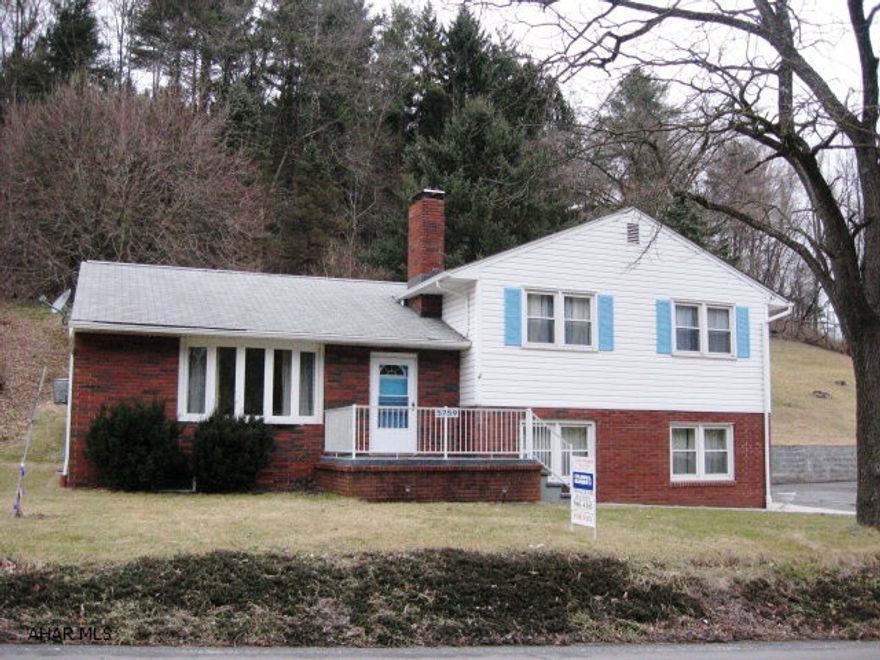 Well maintained 3 bedroom, l bath multi- level home within walking distance of town. Newer windows and doors throughout. Nice family rm with brick fireplace. Vents from family rm  to living rm for additional heat.  Large covered porch. Driveway has additional off street parking.