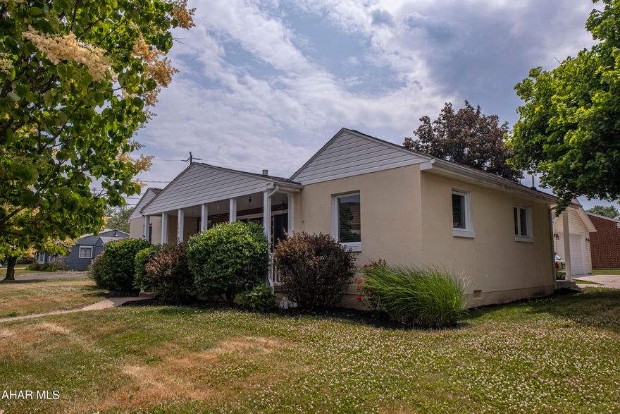 Location, location, location! This beautiful one story, 3 bedroom, 2 bath home is located right across the street from Hollidaysburg Junior High School. It has a heated, two car garage and concrete driveway to offer plenty of off street parking. The large front porch has a a beautiful view! Inside you will find a lovely eat-in kitchen with updates, a gas fireplace in the livingroom, a large office/bonus/laundry room.  There are plenty of closets for storage. You must see this home! Matterport Virtual Tour available. Call for your private showing today!