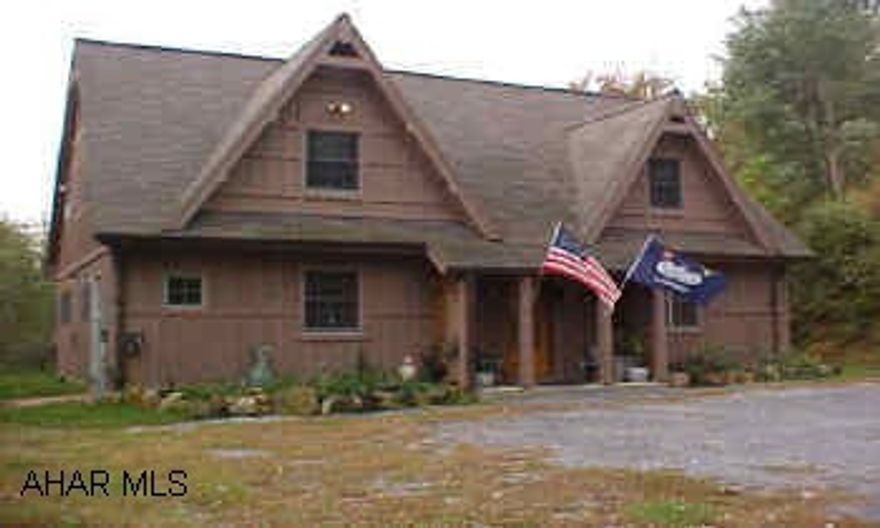 English style Chalet - 30x40  built on 6" insulated oil fired heat system; numerous closets; anderson windows; old farmhouse on property 16x24 suitable for garage/stable/workshop has 220 volt electricity; 9.75 surveyed acres wooded and cleared, with view  9.754 surveyed acres-wooded & cleared; English style chalet- ceramic tile, hardwood floors; all appliances included; oil hot water and basement heat;  also has an old farmhouse on property 16x2 suitable garage/stable/workshop has 220 volt electricity;   taxes $2100/yr  HASD schools; Call Judy at 814-946-9355 vm 335