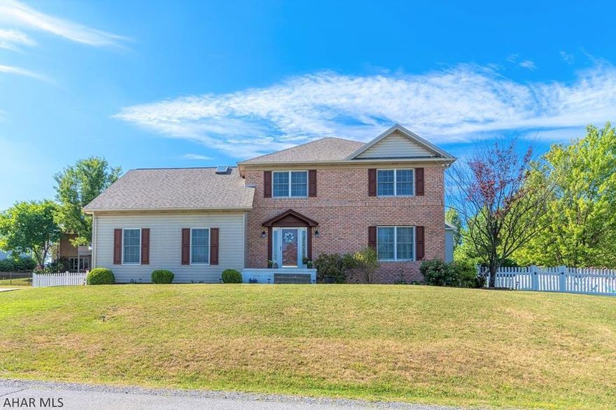 LOWRY LOOKER! This 4 BR, 2.5 BA home is the traditional two-story layout that many people love. First floor has a formal living room with new carpeting and dining room with tray ceiling & hardwood floor. Open kitchen/family room combo with a gas fireplace, eat-in area, sliding doors to back & a large island. Floor in both of these spaces is new too! Also tucked in downstairs is a convenient half bath. Upstairs are the 4 bedrooms, incl a sizeable master suite with tray ceiling, master bath with double vanity, soaker tub, shower, & an amazing walk-in closet. Three spare rooms have good closets too.  Main full bath with skylight. Basement has tall ceilings & could be finished if more livable space is what you prefer.  Attached two car garage. Deck & fenced yard to enjoy-Desirable area!