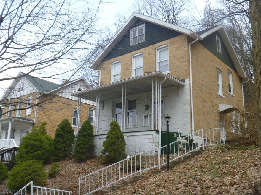 Large brick 3 br 1 ba home in need of TLC. Property was built prior to 1978 and lead based paint potentially exits. Ceiling and flooring in Living Room has been removed, property is in mid renovation and sold as-is. Taxes are estimated and sqf is from tax card.