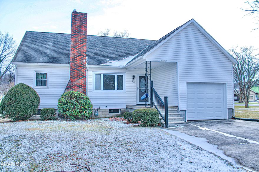 Welcome to this sweet one and a half story home nestled in the heart of Duncansville borough.  Situated on three spacious lots, this property offers plenty of outdoor space while remaining conveniently close to town amenities.
Inside, you'll find beautiful hardwood floors that flow throughout much of the main level adding warmth and character.  The first floor features two comfortable bedrooms, a full bath, and main floor laundry providing convenient one story living.  
Upstairs you'll discover an additional bedroom along with the beginnings of a second bathroom.  The bathroom fixtures are already on site and ready for installation allowing you to easily complete and customize the space to your liking.
An attached one car garage provides the opportunity for secure parking and additional storage.  It currently includes a handicap accessible ramp for easy entry which could also be easily removed to use the garage for traditional purposes.
With its cozy layout, ample lot size, and flexible potential, this Duncansville gem is ready for its next chapter.  So, whether you are a first time homebuyer, downsizing, or looking for a project with solid value, give your real estate agent a call today to set up your private tour!