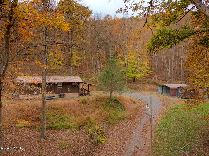Tucked about 1.3 miles out Madley Hollow Road off Route 96, this 2-bedroom, 1-bath home offers privacy and space on a nearly 2-acre wooded lot. Built in 1972, it features a practical single-level layout with an attached shed for storage and a carport at the top of the driveway. The property offers a quiet setting surrounded by trees, perfect for anyone who enjoys nature and a bit of elbow room.

Whether you're looking for a full-time residence away from town or a quiet hunting cabin surrounded by nature, this property fits the bill. The setting is peaceful and secluded, with plenty of room to enjoy the outdoors and make it your own. Could make a comfortable full-time home or the perfect weekend hunting retreat.