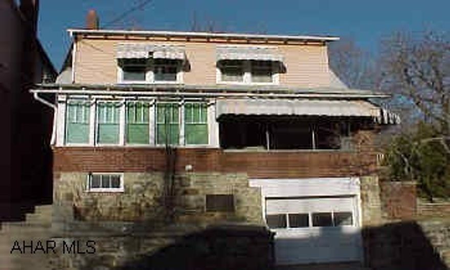 2 story brick and wood  3BR, 1BA integeral garage, full basement Sold  As Is, needs work(roof)