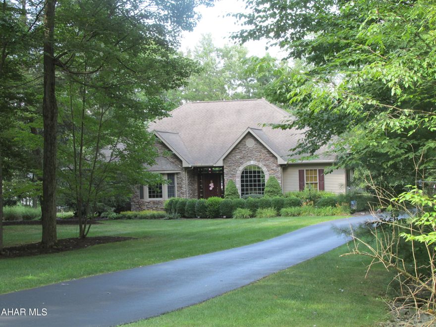 YOUR PERFECT PLACE! Pristing beauty on Edgewood Drive, Tyrone. Conveniently located halfway between Altoona & State College. This pretty one story offers an elegant hardwood entry, 9ft ceilings throughout, large open living room, dining room, kitchen w/quartz counters, tile floor, first floor laundry, den/office or 4th BR, half bath, BR2 & BR3 have a Jack n Jill bath. MBR Suite with shower, whirlpool tub, double vanity, walk-in closet, new furnace, central air & hot water tank, central vac. Water is a shared community well. *See utility info. Beautiful outdoor living w/fenced yard, part covered back & open deck, 2 car garage & full unfinished basement w/walk out - don't wait on this one!