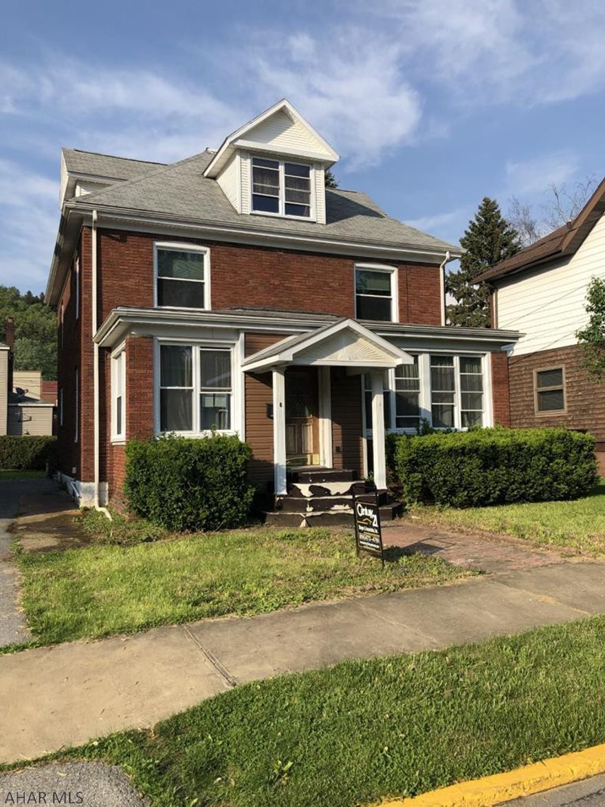 Large 2 story,  3-4 BR brick home with lots of character and recently installed new furnace.  Roof repaired, ceilings of bathroom & bedroom drywalled.  Dining room ceiling & all plumbing repaired.  Electrical updated including new box.  Just needs a little TLC and some new flooring.  Great potential!  Take a look at this one!!