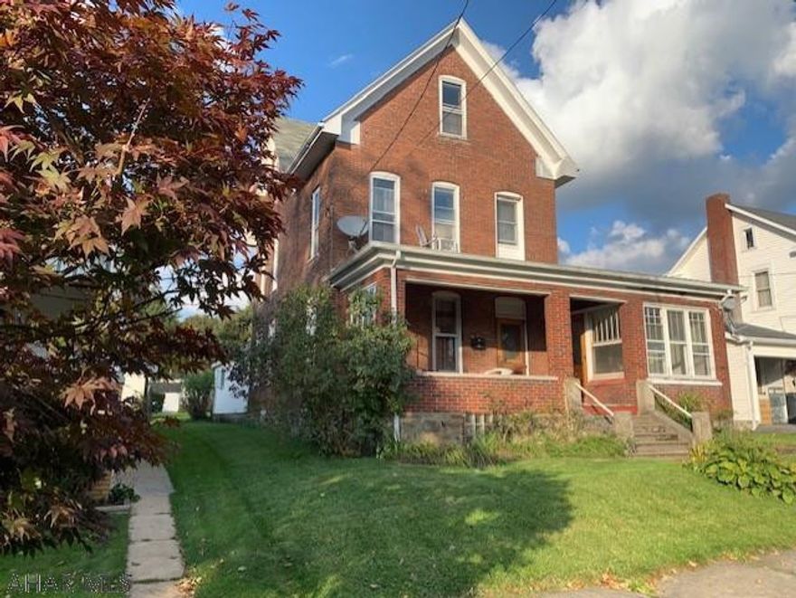 3 story 5 BR brick house in Cresson boro with attached garage and beautiful woodwork! All affordably priced