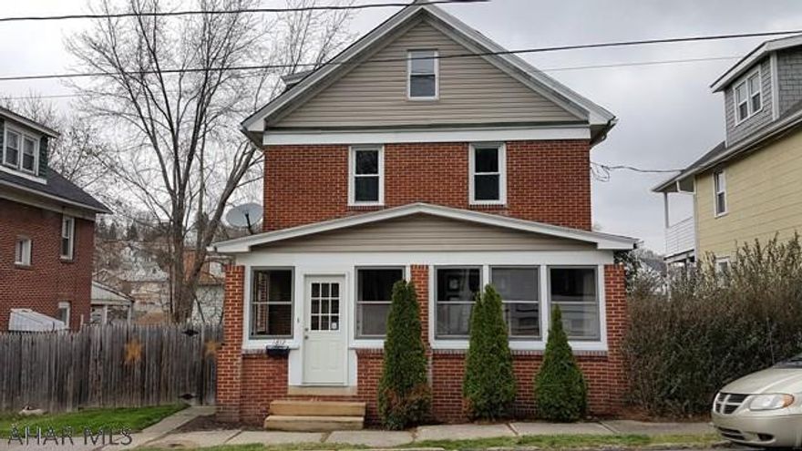 Very nice, 3 bedroom, solid brick home in the heart of Altoona.  This property features hardwood floors, new window's and door, and has been freshly painted throughout.  The spacious living room and formal dining room will make entertaining a breeze.  The kitchen is bright, has newer cabinets and all the appliances are included.  The bedrooms feature hardwood floors and trim, as well as ceiling fans.  The attic is finished, and could be used as a bonus room or fourth bedroom.  The yard is fenced in, and the lawn was reseeded in the summer.  A new roof was installed in 2012.The enclosed front porch is perfect for relaxing after a long day.  This property is in move-in ready condition and will not last.  Why rent, when you could own!