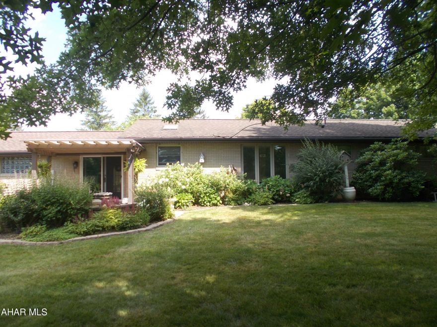 Totally move in brick ranch across from the Summit Country Club in Cresson Township.
2 fully redone baths, updated kitchen with granite counters, white oak cabinets, stainless cabinets, and engineered hardwood throughout the home.  A totally finished basement with a kitchen, laundry, bar, and beautiful stone fireplace.  Natural gas heat source and cental air completes the picture of this sought after home,