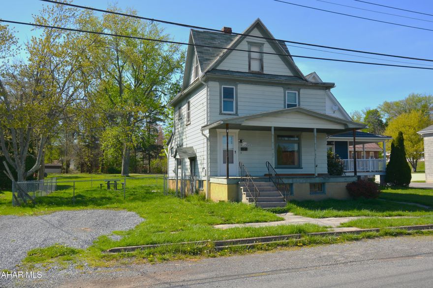 Conveniently located near Penn State, this 3-bedroom home offers a fantastic opportunity for both homeowners and investors alike.  The first floor includes a living room, dining room, laundry hookups & kitchen area.  Second floor has a full bath & 2 bedrooms.  The attic is finished with a bonus area outside of the 3rd bedroom. The sale includes three parcels, providing parking and a spacious fenced-in yard—perfect for pets, gatherings, or future expansion.  Whether you're looking to expand your investment portfolio or seeking a home to personalize with your own updates and style, this property has the potential for both.  Call for your showing today!