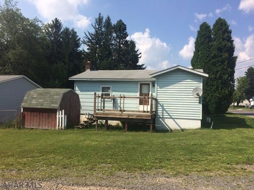 This cozy ranch fixer upper is in a great neighborhood on a corner lot. New sewer line. Large detached garage for storage also an integral garage. Currently home has an oil furnace that needs replaced. Gas is available at the property. Included in the sale is the refrigerator and dryer. Make this one your own.