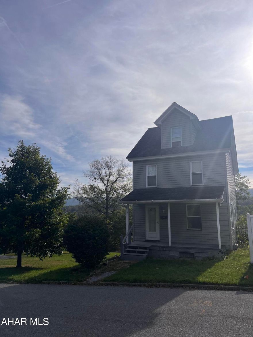 Easy to show, this 3BR home sits on a sweet corner lot with space to expand on your outdoor living space. Attic is the 3rd BR but nice and bright! Newer roof and sewer line. Updated kitchen (w/walk in pantry) and bath. 2nd Floor bath big enough to add laundry to 2nd floor if so desired. 2nd bath is in basement.,