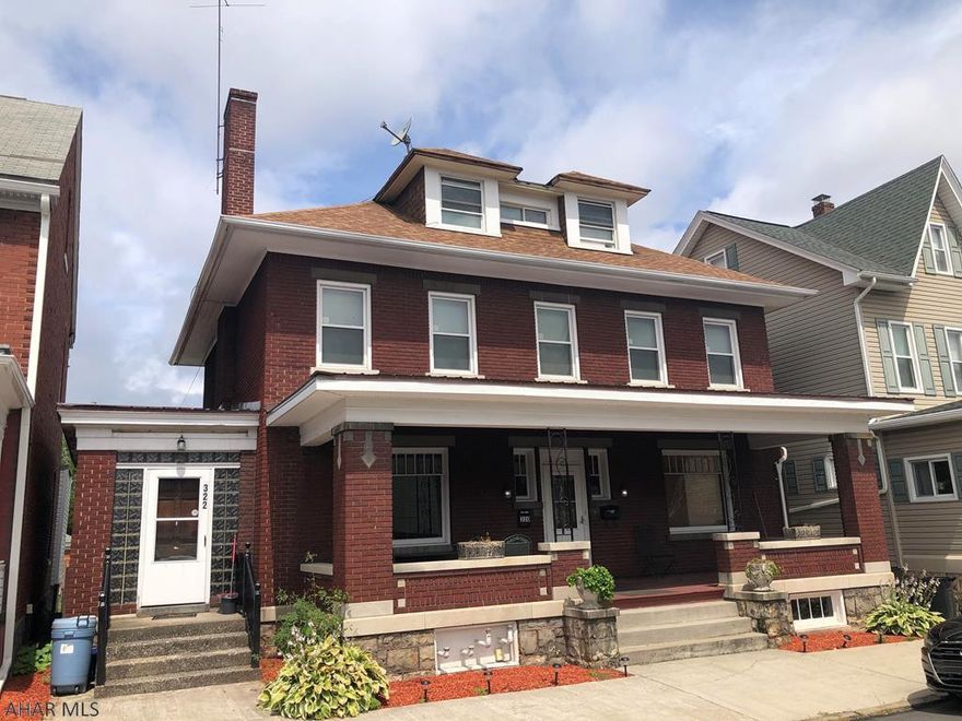 Large brick duplex formally a doctor's office. Both units are 2 bedroom, tenants pay heat and electric. There is a detached 3 car garage. 2 of the garages are rented and the 3rd could be. Current rental certificates.