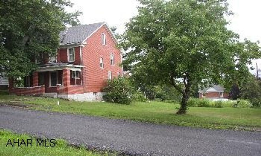 ALL BRICK CONSTRUCTION LOCATED IN QUIET AREA OF ALTOONA. LARGE FLAT LOT WITH AN UNOPENED ALLEY. NEEDS TLC, BUT WITH WORK COULD BE A SOLID HOME.