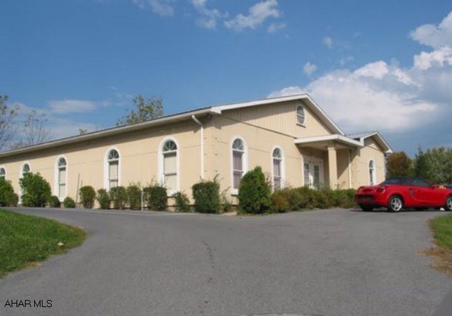 High visibility location just off Rt 30. 2 bldgs - main 2,250sf - 2nd 950sf. Great for professional office. Central air. Seller will consider lease.