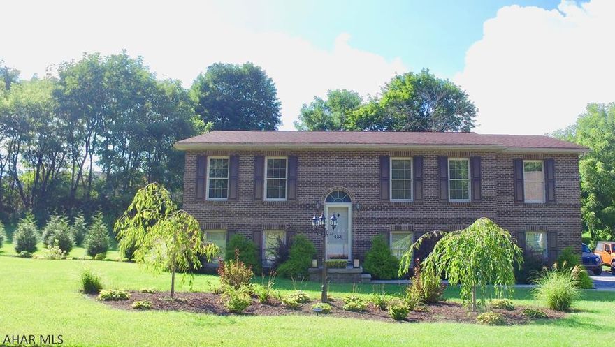 This meticulously maintained 3 bedroom, 2 bath home is sure to impress the most discriminating buyer.  No detail was overlooked when building this home!  Upon entry, one will automatically feel as if they are entering a newly built home.  Main floor master suite, gorgeous kitchen with walk out to deck overlooking a lovely tree lined backyard, cathedral ceilings in living room, finished lower level, garage that can accommodate three cars, central air conditioning and so much more.  Lovely quiet street located close to Claysburg.  A must see home that will not last long!