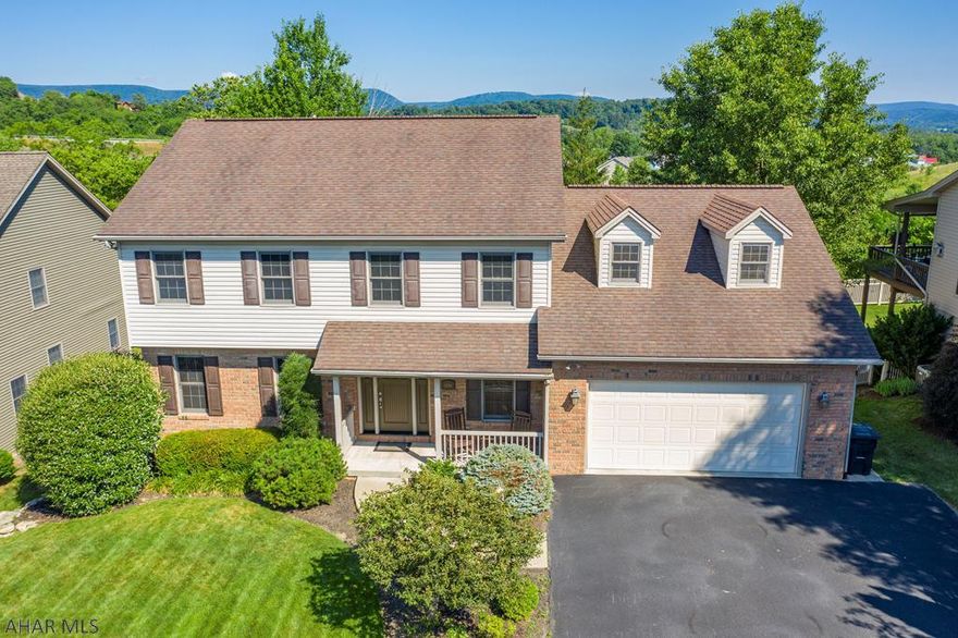 Move right into this beautifully updated home in Edgewood Estates. Spacious & inviting - 4 bdrms, 2 full & 2 hlf bths, 2 car garage & 1st flr lndry. The open kitchen features new SS appliances, refinished cabinets & new quartz counter tops. The expansive space opens into a gorgeous eat-in kitchen & family room with a gas fireplace. Stunning master suite has a bonus room, huge walk-in closet, 2nd closet along with a walk-in shower and jacuzzi tub. Downstairs offers a finished room with a fireplace perfect for entertaining as well as 2 large rooms with tons of storage space & shelving. Relax on the large deck that is just steps off the kitchen. Other updates include customfrenchdoors installed in the office,new flooring,new front door,new kitchen sink & lighting,updated 1/2 bath.