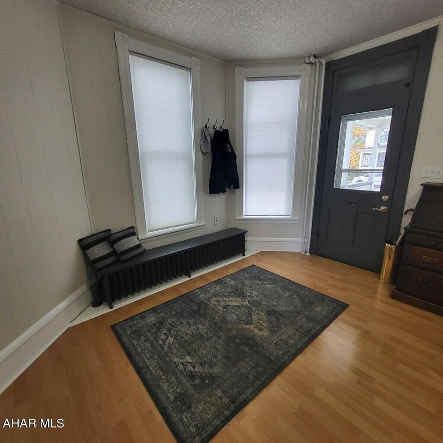 Beautifully remodeled three bedroom, one bathroom home located in the heart of Tyrone. Off street parking is located in the back of the house. Enter the home into the mudroom, complete with shelving for all of your coats and shoes. The bright and airy kitchen features brand new cabinets, sink, countertops and coffee bar. Carpet leading to the. second floor was installed in 2020. New bath tub surround and storage shelves. Fresh paint throughout the entire house. Three bedrooms and one bathroom are located on the second floor. Master bedroom features new closet organizers. On the third floor you will find an additional room that could be used as a gym, home office or storage. Enjoy fall evenings outside with a cup of tea on the brand new concrete patio. Roof was installed in 2018. This home is also located close to many local amenities. Located just half a mile down the road is a park with play grounds, basketball courts and a reservoir stocked with trout. Don't miss the opportunity to call this YOUR home!!