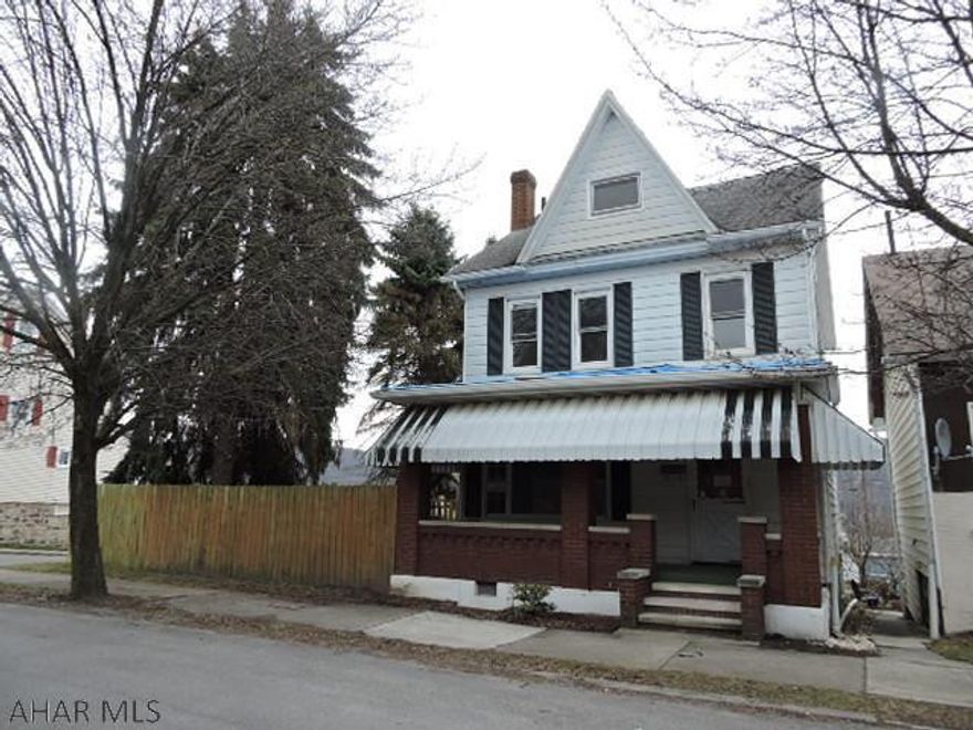 3 Bedroom house on nice corner double lot with privacy fence.  Big detached garage can fit 4 cars & has a 1 car overhead door.   As is where is sale.