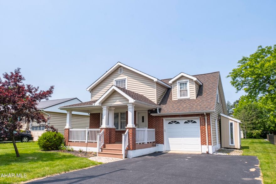 Located in a highly desirable area of Hollidaysburg Borough, this charming and well-maintained 3-bedroom, 2-bath home sits on a large, level lot with plenty of outdoor space! Inside, you'll find hardwood floors, a gas fireplace in the living room, and a modern kitchen offering ample cabinet space and excellent storage. All three bedrooms are generously sized, providing comfortable living space throughout.
Additional highlights include a covered front porch, a rear deck equipped with an electric awning—perfect for outdoor enjoyment in any weather—and a 1-car garage. A full, unfinished basement provides valuable storage space and potential for future expansion.