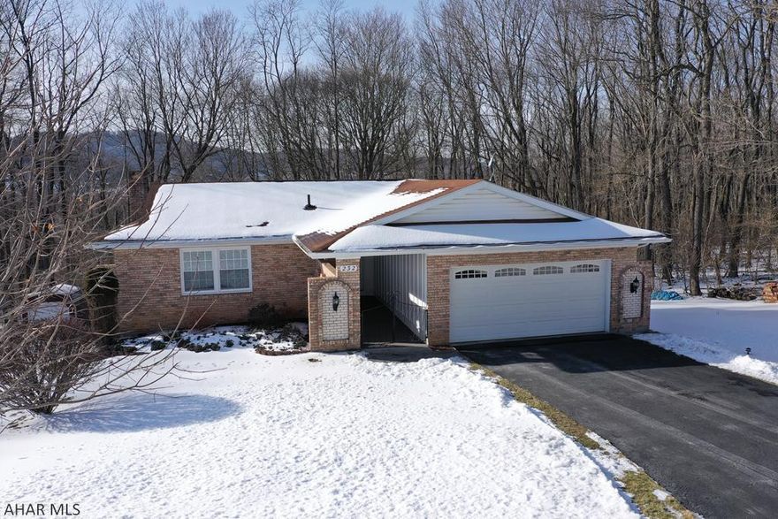 This is a stunning ranch style home that has been carefully maintained by the original owners!  The home is situated on a large wooded lot at the edge of a cul-de-sac.  3 bedrooms and 2 full baths on the main level PLUS a 4th bedroom and 3rd full bath in the finished basement.  The kitchen is updated with included appliances.  The master bedroom is large with an en-suite full bath.  There is an open concept dining room and living area.  The basement has plenty of space for extra living room and could easily be used a guest suite.  There is a wood fireplace and separate laundry room (included washer and dryer) with a workshop area in the basement as well.  There is even a 2 car garage and shed.