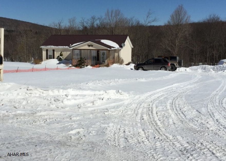 If you have been searching for a ranch home with acreage, pond and privacy, this home is for you. Three bedrooms plus 1 full bath,  bath and laundry room make the first floor very convenient. The lower level has an additional bedroom,  bath and family room with French doors that open onto a private patio. Hunters will delight in the 23+ acres where wildlife is abundant and for the fisherman, a stocked trout stream runs through the property. Nicely decorated throughout, move-in condition with many updates including new roof. A terrific buy!