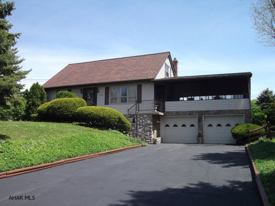 Great location!   Sweet 4 bedroom 2 bath home with brand new windows.  Enjoy the summer breeze from the large screened in patio!  Family room with bar area in basement.