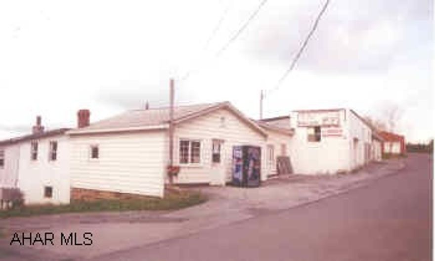 OFICE BUILDING WITH ATTACHED WAREHOUSE.  THERE IS ALSO ANOTHER LARGE DETACHED STORAGE BUILDING. THE ORIGINAL DEGOL BROTHERS OFFICE.  VERY LARGE BUILDING. MUST SEE INSIDE TO APPRECIATE.  THERE IS ALSO A DETACHED STORAGE BUILDING. CONTINGENT UPON SUBDIVISION.