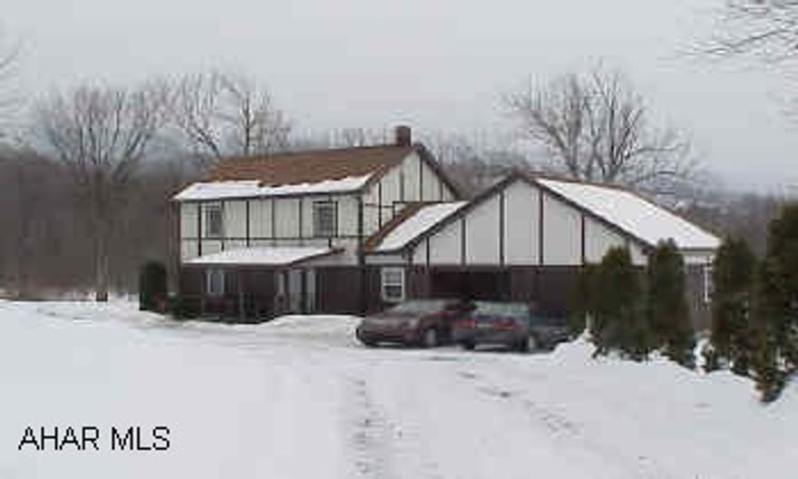 Gorgeous 5 acres of level, cleared ground.  Very private with new 16x32 inground pool.  Neat two-story family room and new two-car garage.  Basement has pool room with bar.