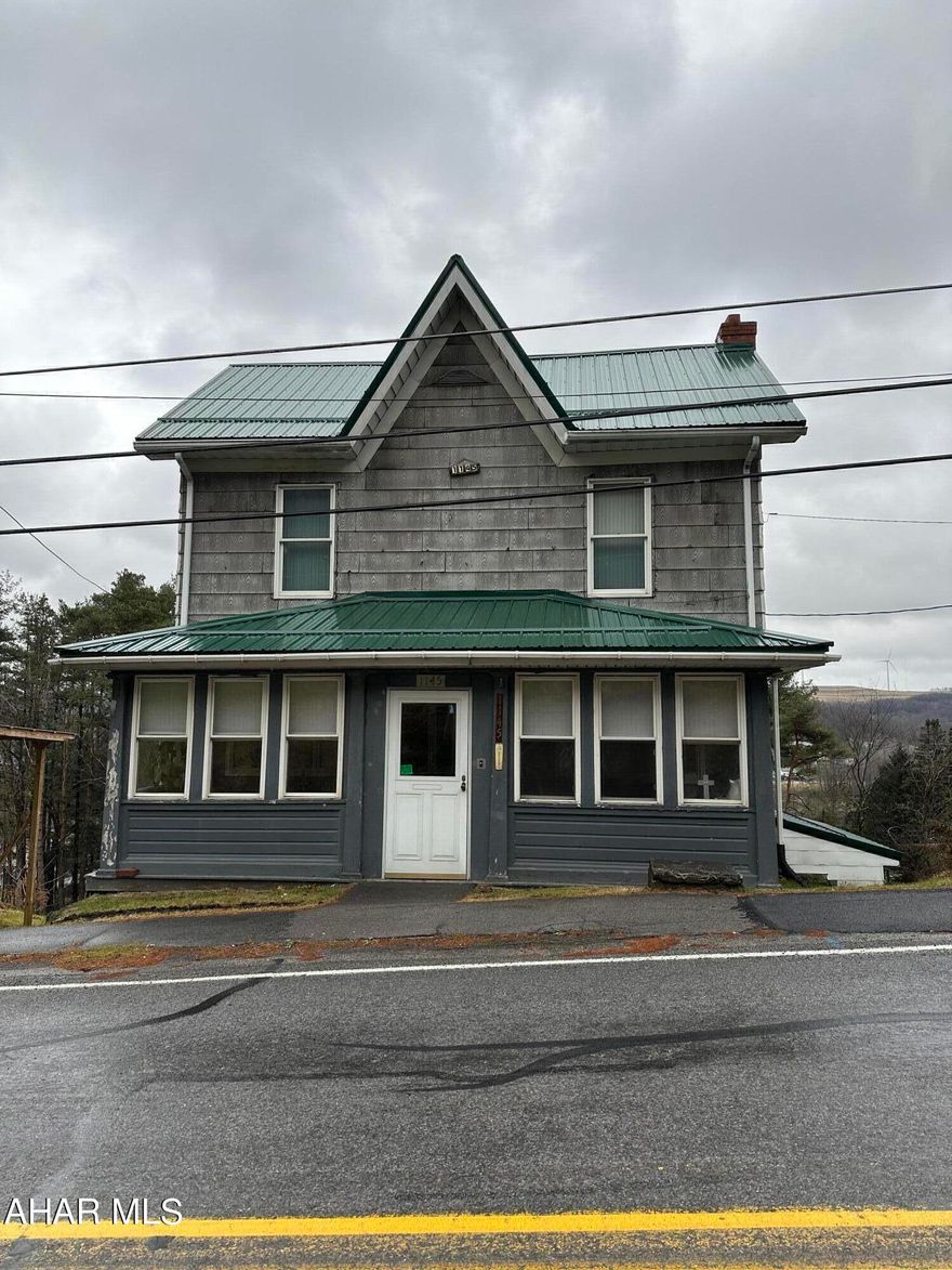 Why rent when you can own? Nice 2 bedroom 2 bath home on the outskirts of Hastings.  Updates include new roof and new boiler. The first floor features two enclosed porches, eat in kitchen with laundry, living room and first floor bath.  There are two bedrooms and a full bath on the second floor.  One car detached garage and one car carport.