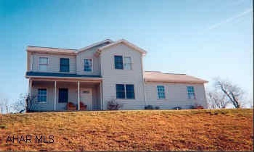 Two story house with 3 BR 2.5 BA on 2 acres. Possible 4th BR or office in basement. Electric heat pump with oil heat backup. C/A. Pergo floors in kitchen and dining room.Attached two-car garage. Two story house with 3 BR 2.5 BA on 2 acres. Possible 4th BR or office in basement. Electric heat pump with oil heat backup C/A, Pergo floors in kitchen and dining room. Attached 2 car garage.  Beautiful view! !  Minimum $1000 earnest money deposit. Qualified buyers only. REDUCED PRICE!!  Can show anytime. Call Listing office for appt. Key in office