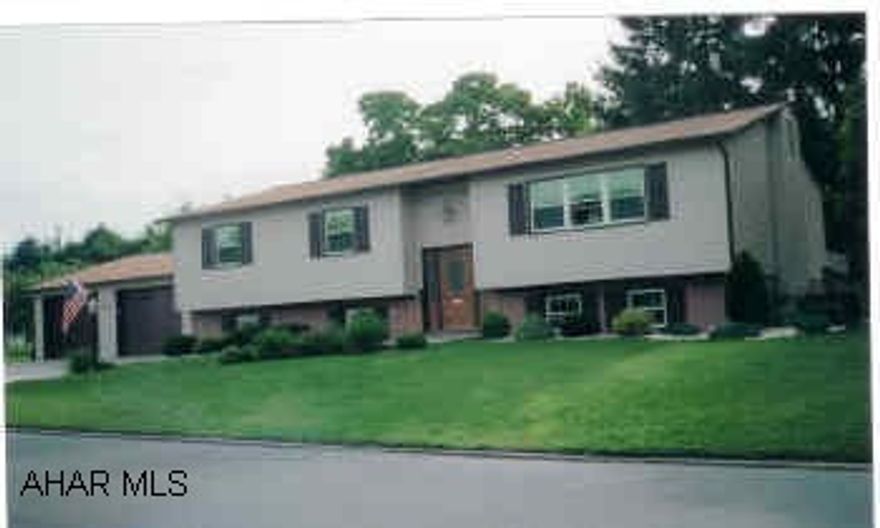 Top of the line raised ranch on corner lot. New oak custom kitchen, full finished basement, new sunroom, 35 year roof, new windows and siding, newer neutral carpeting.  Beautifully remodeled, oak woodwork throughout, 4 bedrooms, 3 full baths, guest suite in basement, newly painted interior, corian counters, all new appliances included, neutral throughout, custom window treatments included.