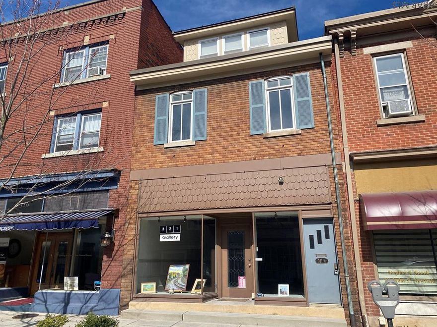 Located in the Heart of Historic Hollidaysburg this 2661 square foot building has so much to offer.  The first floor features a commercial retail space with large display windows, natural light, a bathroom, and tons of storage.  The second and third floor consist of a 2 bedroom apartment with separate entrance.   If you are looking to run a business while living at the property, rent one of the units for additional income, or rent them both as an investment property the endless potential is there.