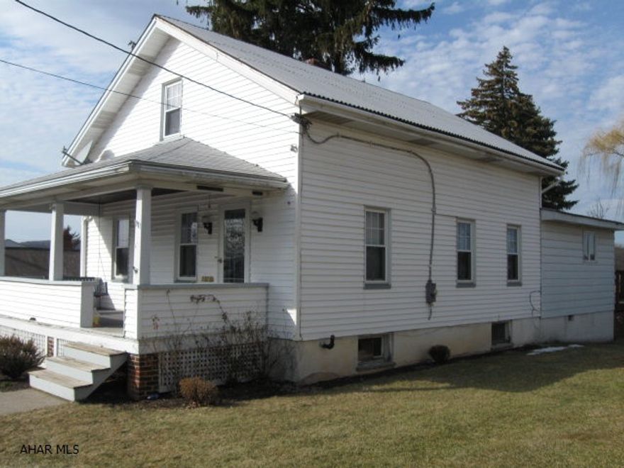 MARTINSBURG BORO 2 to 4 bedroom on level .5 acre lot.  Newer kitchen and bath, large deck, detached garage with carport/patio.  First floor addition has separate entrance and can be used as bedroom, office or den.