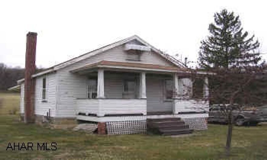 CUTE "LITTLE" ONE STORY ON TWO ACRES. SMALL COTTAGE LIKE ONE STORY ON TWO LEVEL CLEARED ACRES. MECHANICS ARE ALL GOOD. DUG WELL. OWNER WILL ESCROW FOR DRILLED WELL. NO SHOWINGS UNTIL 4/24/06.