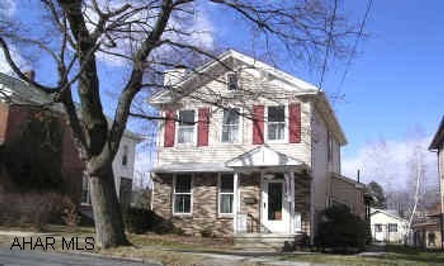 2 STORY OLDER HOME. SUPER OLDER HOME IN HOLLIDAYSBURG BOROUGH.  NEW SIDING, OAK KITCHEN WITH GLASSED SUNROOM, UPDATED 1/2 BATHS, TERRIFIC COVERED DECK.  HOME WARRANTY INCLUDED.  HEAT IS $125 AVERAGE.